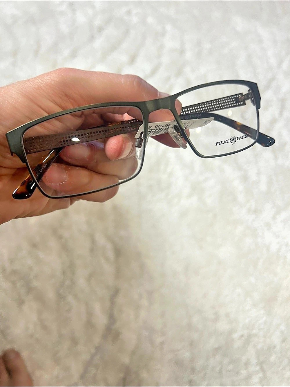 Lot of eyeglass frames.